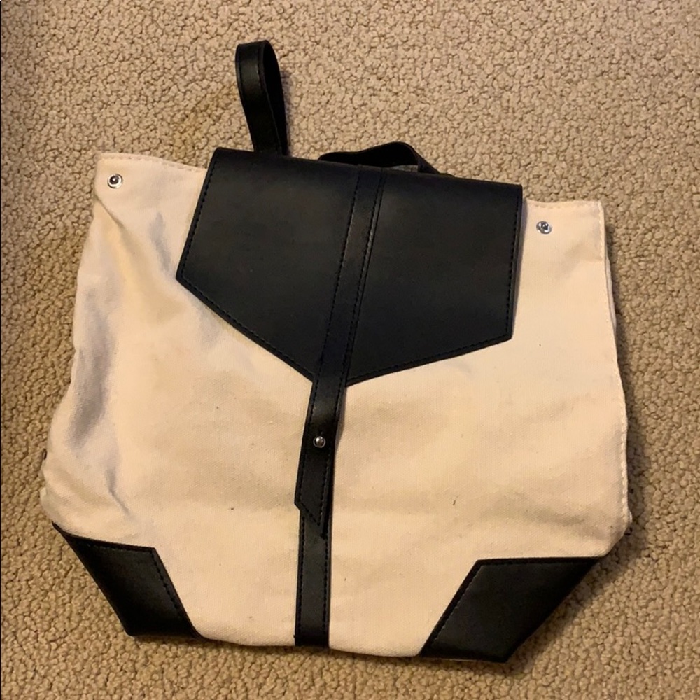 Black and white vegan leather backpack